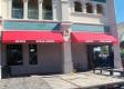 Awnings provide decorative functional storefront advertising. Serving Polk County Including Orlando FL 
32808