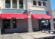 Awnings provide decorative functional storefront advertising. Serving Polk County Including Union Park FL 
32831